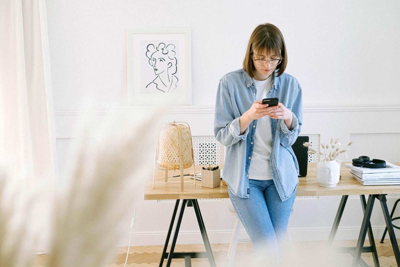 woman viewing information on phone